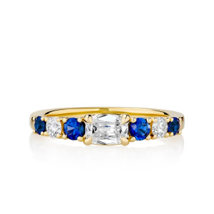 East/ West Prong Set Cushion Diamond Flanked by Alternating Blue Sapphire