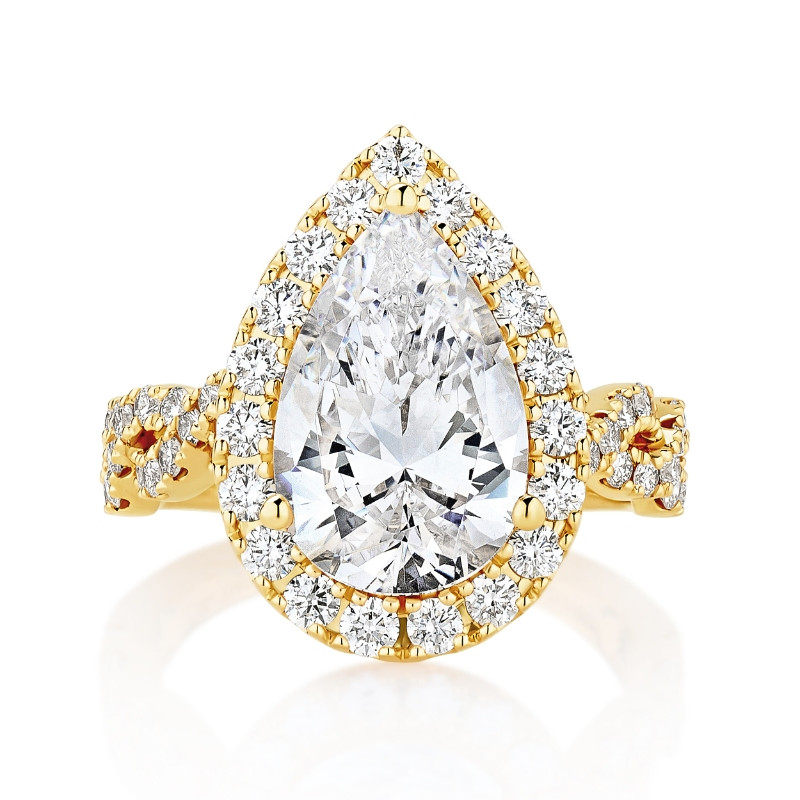 Twisted Shank Engagement Ring with Diamond Halo